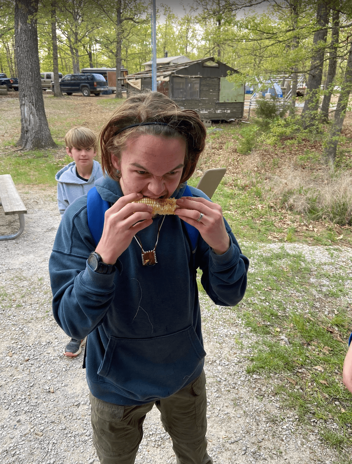 Scout eating corn on the cobb.