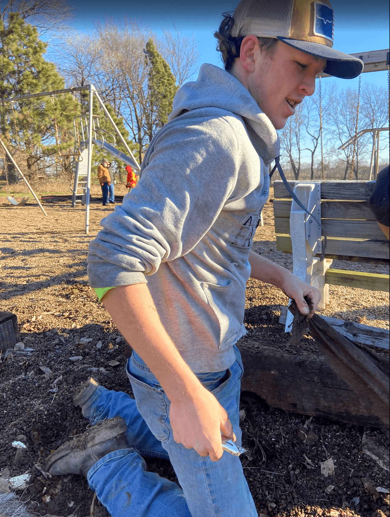 Boy doing community service work.